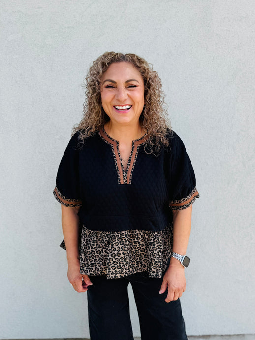 Can't Be Tamed Textured Short Puff Sleeve Top Featuring Animal Pattern contrast Ruffle Hem