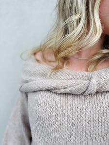 The Off Duty Coquette Off Shoulder Front Twist Knit Beige Sweater